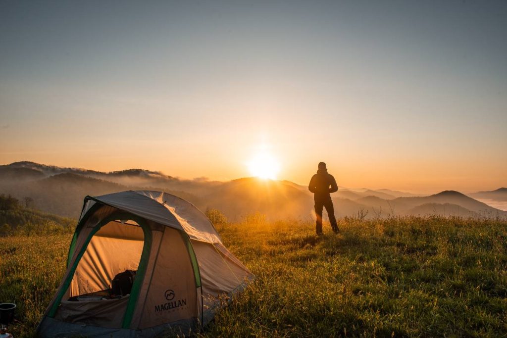 Pitching a tent and gazing into the sunset