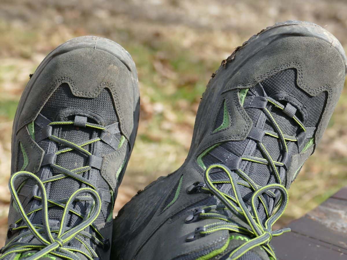 Why do my feet sweat when hiking, shown by warm hiking shoes with limited breathability.